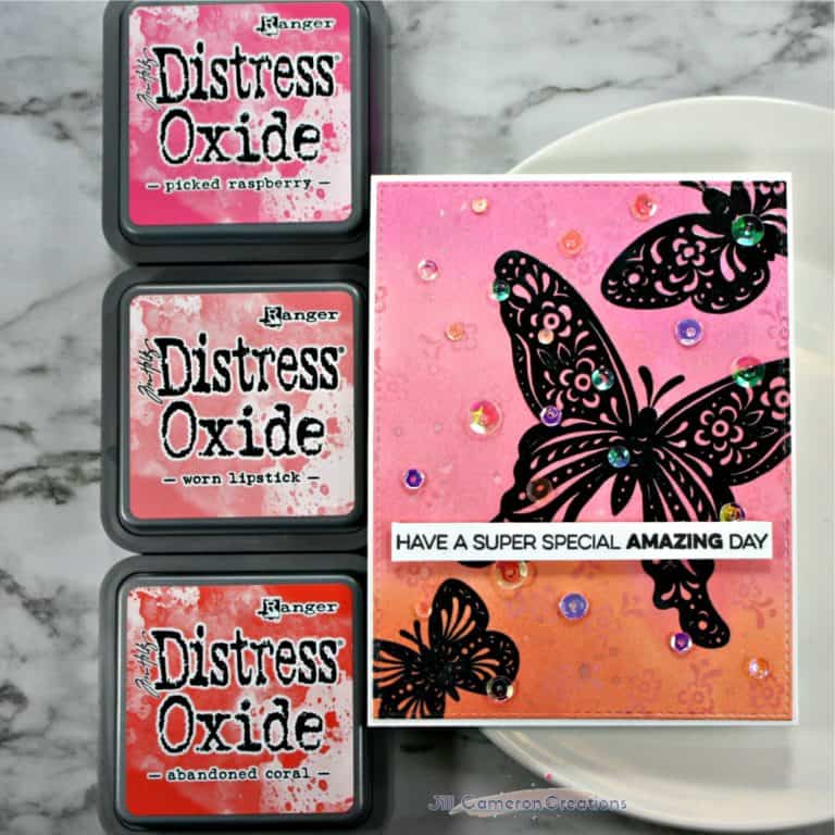 how to ink resist with bold embossed image